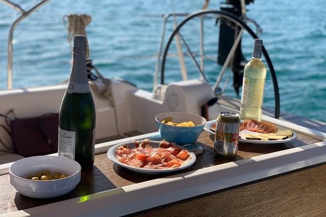 Barcelona Sunset Cruise With Light Snacks and Open Bar - Confirmation and Accessibility