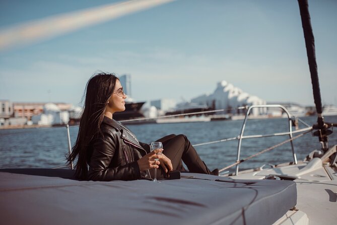 Barcelona Sunset Cruise With Open Bar of Cava & Local Champagne - Booking Confirmation and Accessibility