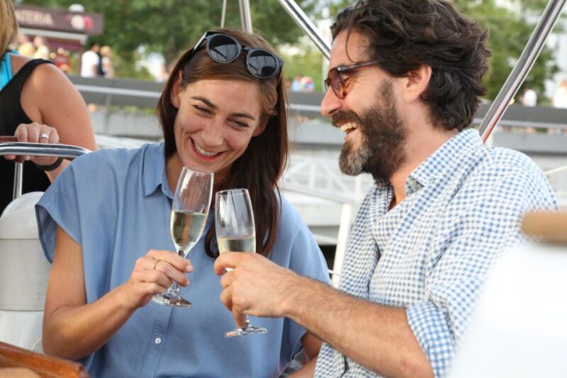 Barcelona: Sunset Sailing Tour With Tapas and Open Bar - Key Points