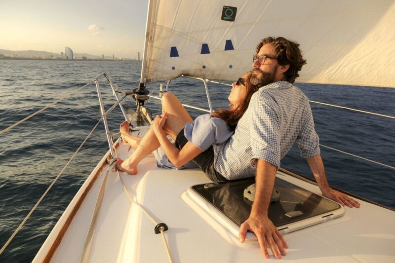 Barcelona: Sunset Sailing Tour With Tapas and Open Bar - Discovering Barcelonas Coastline