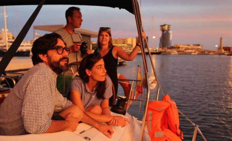 Barcelona: Sunset Sailing Tour With Tapas and Open Bar - Onboard Amenities and Inclusions
