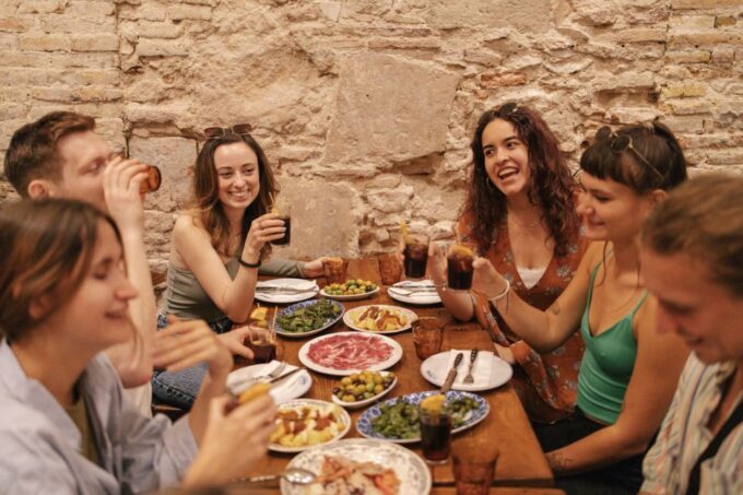 Barcelona: Tipsy Tapas Food Crawl Walking Tour With Tastings - Learn About Catalan History and Cuisine