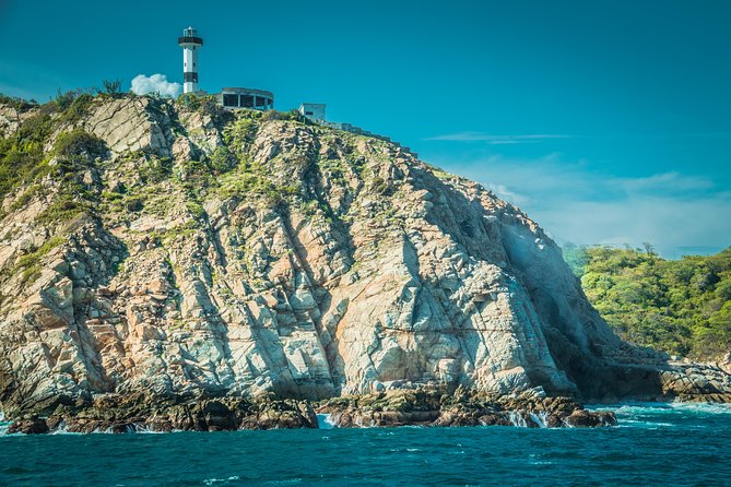 Bays of Huatulco and Snorkeling on a Double Decker Catamaran - Pickup and Meeting