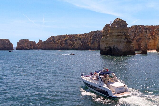 Benagil Private Yacht From Lagos With Drinks, Tapas, Paddle Boards and Kayak - Cancellation and Accessibility