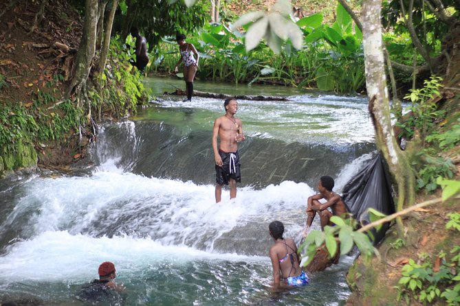 Benta River Falls & Ricks Cafe Day Tour From Grand Palladium - Tour Overview