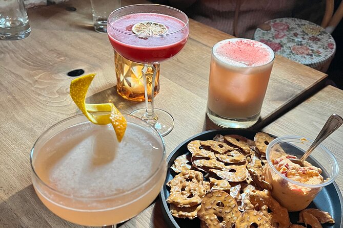 Bites and Booze: Walking Food & Drinking Tour in Culinary Hub - Indulging in Flavors and Libations