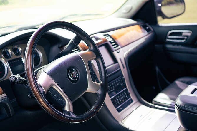 Black Cadillac Escalade/Suburban Round Trip Airport Transfer UVF - Inclusions Provided