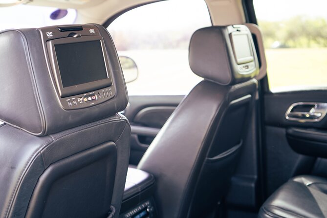 Black Cadillac Escalade/Suburban Round Trip Airport Transfer UVF - Pickup and Drop-off Logistics