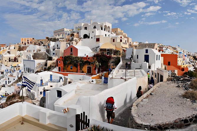 Blue Dome and Oia Sunset Small Group Transfer - Exploring Oias Alleyways