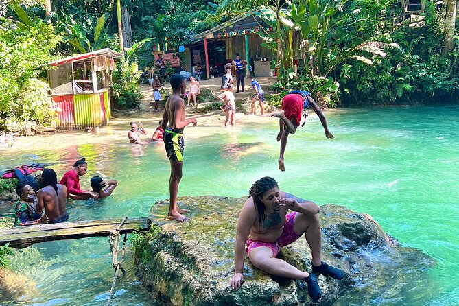 Blue Hole Waterfalls and Bamboo Rafting With Transportation - Bamboo Rafting Experience