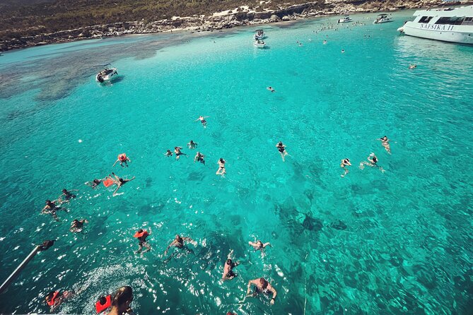 Blue Lagoon Trip With Slide & Music Departing From Latchi Harbour - Language Availability