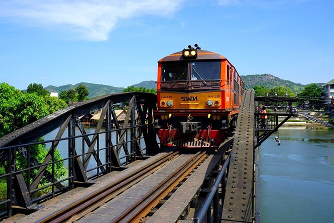 Boat Trip River Kwai and Erawan Falls Full Day Tour From Bangkok - Visiting the JEATH War Museum