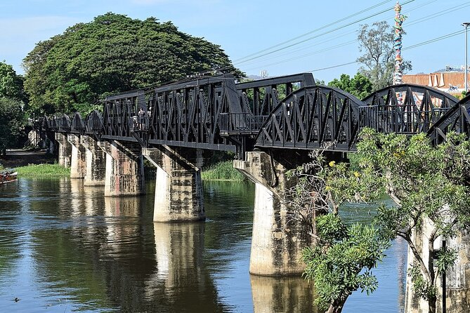 Boat Trip River Kwai and Erawan Falls Full Day Tour From Bangkok - Experiencing the 7-Tiered Waterfalls