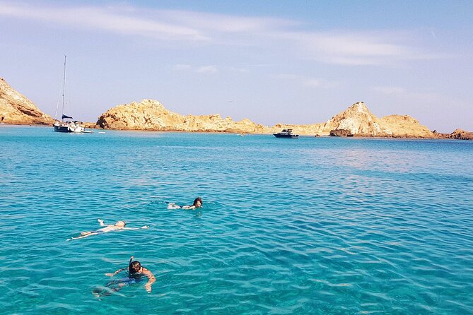 Boat Trip Through the Coves of Northern Menorca From Fornells - Promenade Dock and Departure