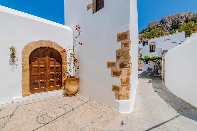 Boat Trip to LINDOS With Swimming Stops at Anthony Quinns & Tsambika Bays - Minimum Number of Travelers Required