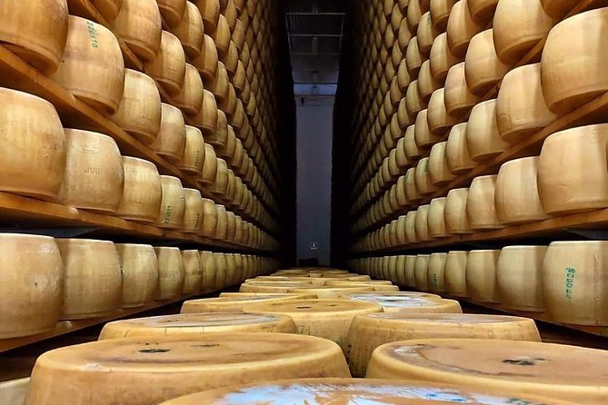 Bologna Food Experience: Factory Tours & Family-Style Lunch - Prosciutto Production Walkthrough