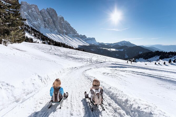 Bolzano Dolomites: Winter Hiking & Sledding Experience - Guide Expertise