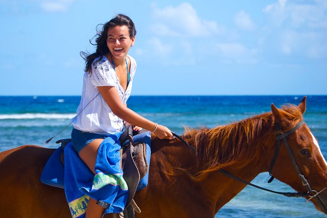 Braco Stables Horseback Ride and Swim Excursion From Runaway Bay - Dress Code and Safety Considerations