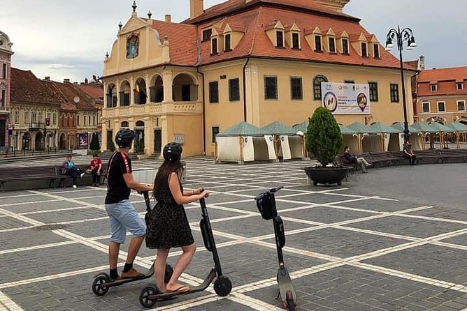 Brasov Old Town Guided Tour With Electric Scooters - Admiring the Councils Square