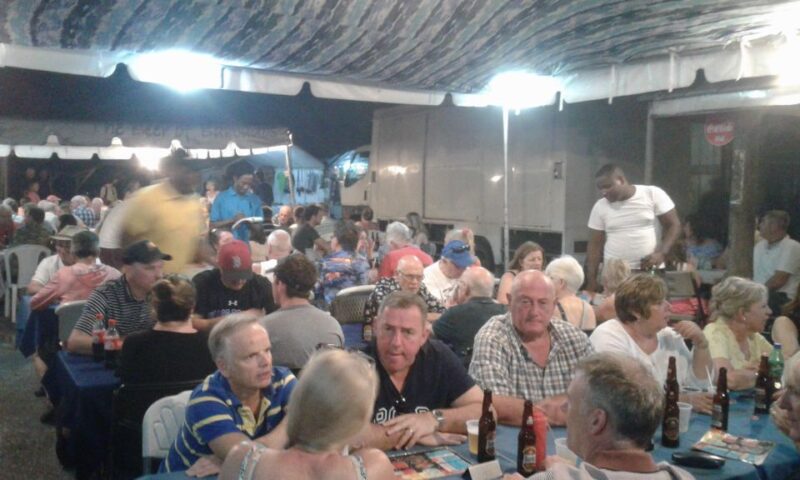 Bridgetown: Oistins Reservation With Drink & Hotel Transfer - Language and Tour Guide