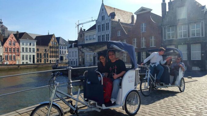 Bruges: Guided Rickshaw Tour - Price and Duration