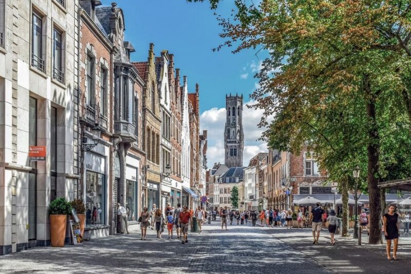 Bruges: Guided Walking Tour and Canal Boat Trip - Unique Perspective