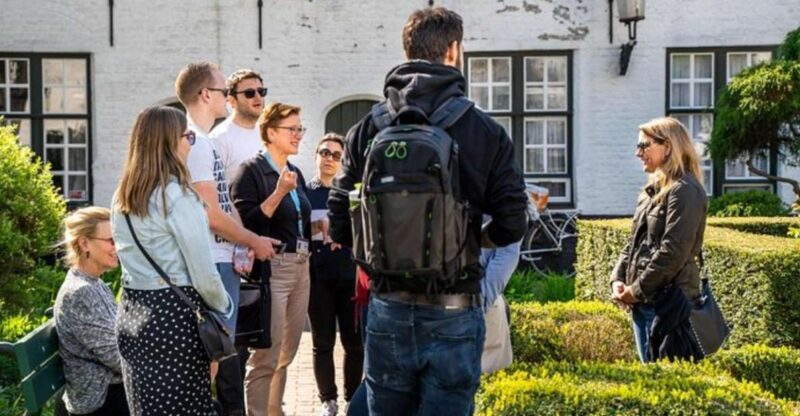 Bruges: Guided Walking Tour With Beer and Waffle - Pricing and Booking
