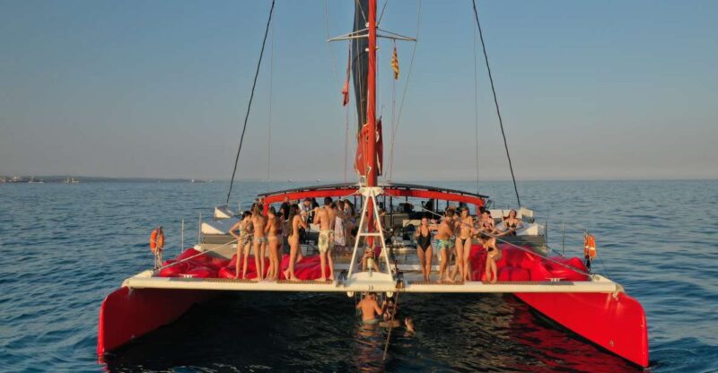 Cambrils: Catamaran Day Cruise With BBQ and Drinks - Relaxing on Balinese Beds