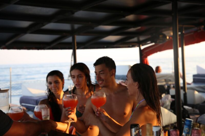 Cambrils: Catamaran Day Cruise With BBQ and Drinks - Swimming in Blue Waters