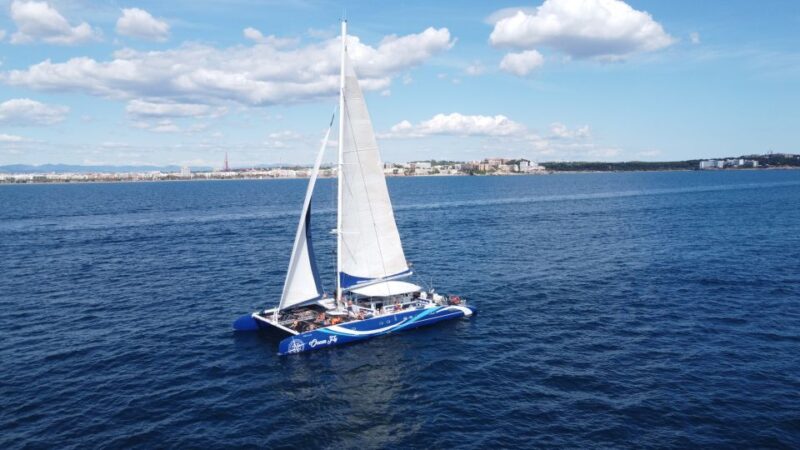 Cambrils: Costa Dorada Catamaran Day Cruise With BBQ Lunch - Relaxing on the Deck