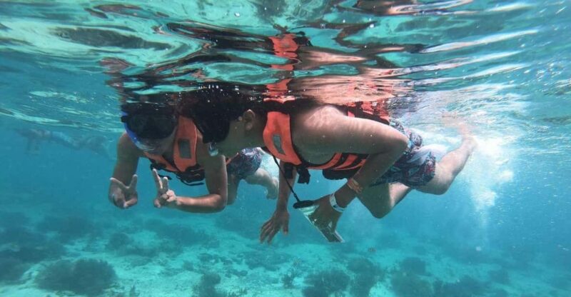 Cancun: Isla Mujeres Catamaran Cruise With Snorkel and Lunch - Itinerary Highlights