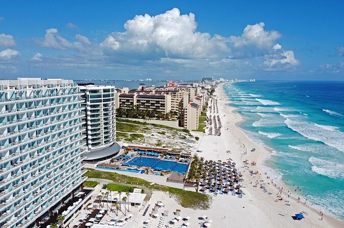 Cancun Private Airport Transfer with 1 Hour City Highlights Ride - Stop 3: The Hotel Zone Drive – Scenic Coastal Cruise