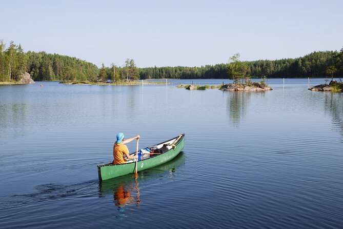 Canoeing Trip to Reindeer Farm and Husky Park Visit - Canoeing on the River