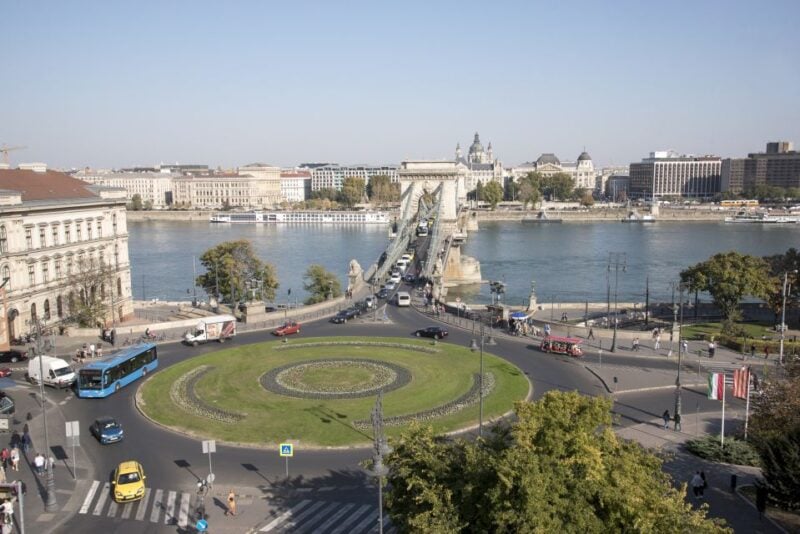 Castle District & Pest Driving Tour With Danube River Cruise - Exploring Budas Castle District