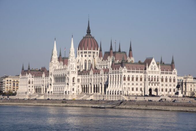 Castle District & Pest Driving Tour With Danube River Cruise - Driving Through Pest