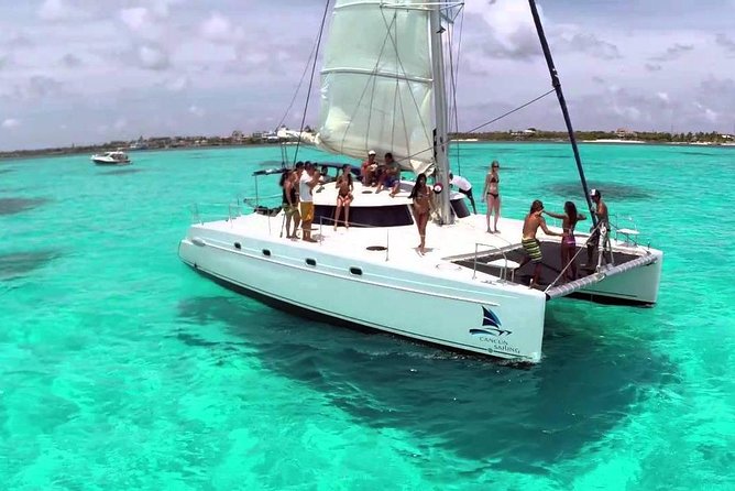 Catamaran Adventure to Isla Mujeres With Snorkel,Buffet,Open Bar and Beach Club - Pricing and Cancellation Policy