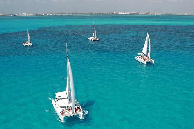 Catamaran Adventure to Isla Mujeres With Snorkel,Buffet,Open Bar and Beach Club - Experience Overview