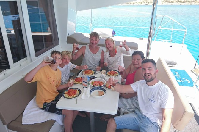 Catamaran All Inclusive-Day Cruise to Naxos or Paros With Lunch - Confirmation and Accessibility