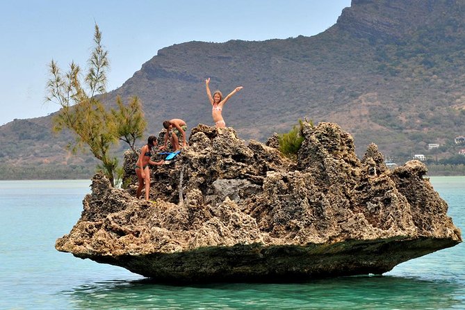 Catamaran Cruise to Ile Aux Bénitiers: Dolphin Watch, Crystal Rock & Transfer - Booking and Cancellation Policy