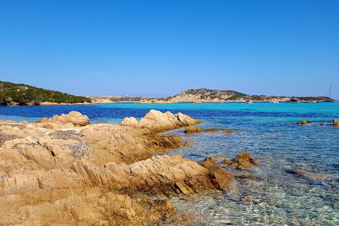 Catamaran From La Caletta - Sardinia - Capo Comino - Isola Rossa - Meeting and Pickup