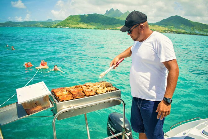 Catamaran Ile Aux Cerfs, Snorkeling + GRSE Waterfall, BBQ & Bar - Relaxation and Adventure