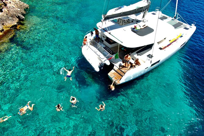Catamaran in Alghero, Daily Boat Trip - Pricing and Cancellation Policy