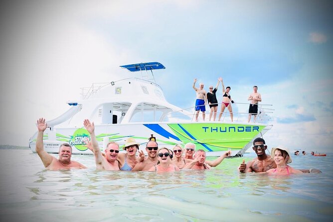 Catamaran Party Boat Half Day Trip With Snorkeling and Natural Pool - Accessibility and Cancellation