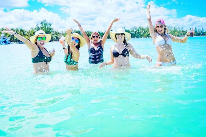 Catamaran Party Boat Half Day Trip With Snorkeling and Natural Pool - Booking and Reservation