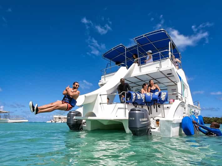 Catamaran Party Boat With Open Bar and Snorkeling in Punta Cana - Key Points