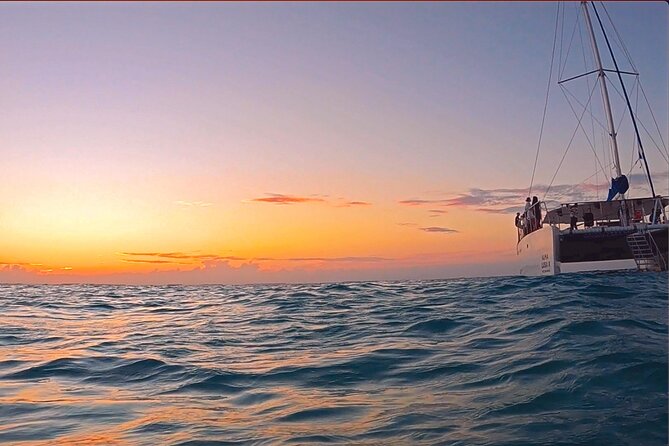 Catamaran Sunset Cruise to Isla Mujeres From Cancun - Scenic Boat Ride and Island Exploration
