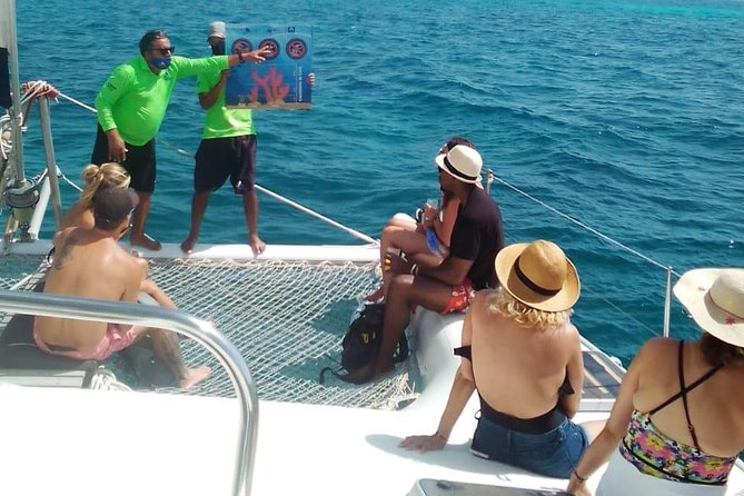 Catamaran to Isla Mujeres, Open Bar, Buffet, Beach Club Included - Island Exploration Highlights