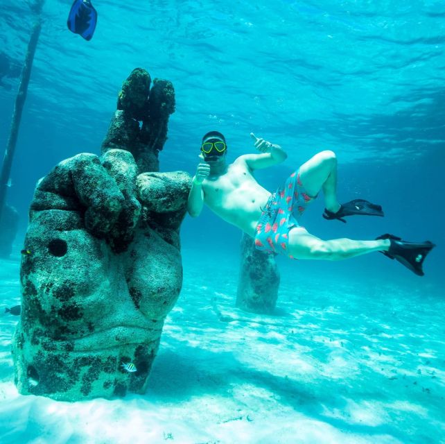 Catamaran to Isla Mujeres: Snorkel, Open Bar & Transfers - Key Points