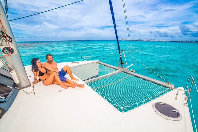 Catamaran to Isla Mujeres Snorkeling Tour With Open Bar and Lunch - Pricing and Duration