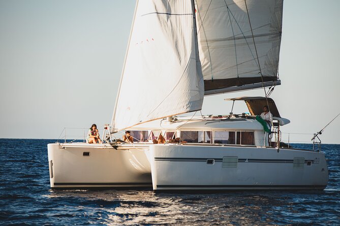 Catamaran Tour From Cala Jandal With Gastronomic Experience - Experience Itinerary and Duration